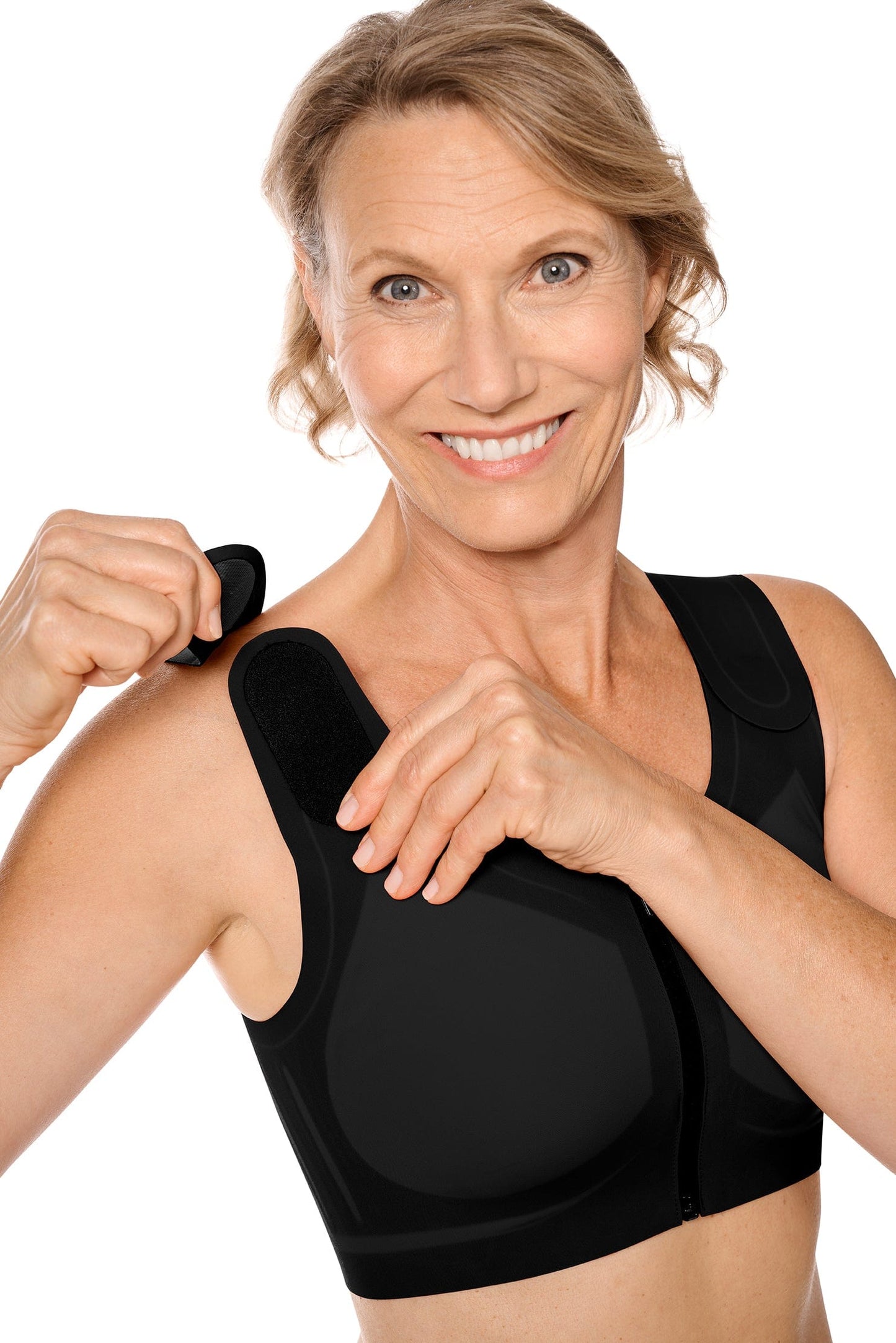 Detail view of the Amoena Lymph Flow bra in black demonstrating the adjustable hook and loop straps