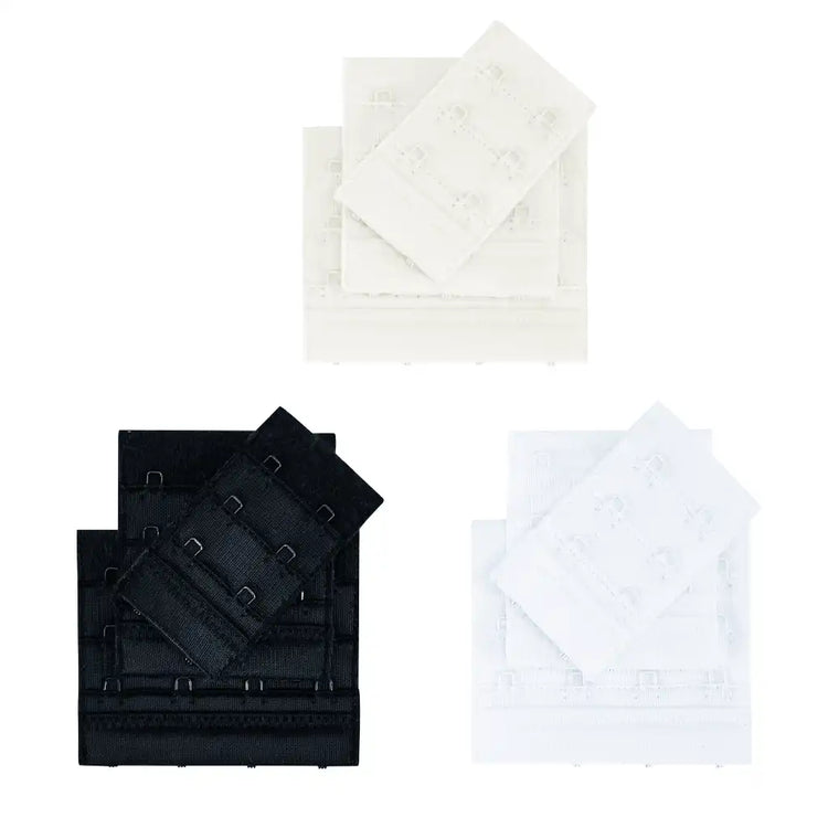 Amoena bra accessories including extenders, straps, and comfort pads displayed on a neutral background