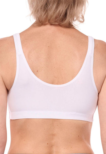 White sports bra worn by a person on a white background