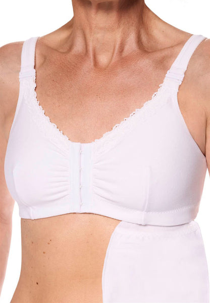 White bra worn by a person on a white background