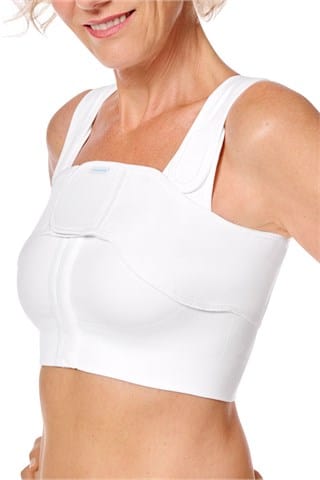 Amoena anatomical compression belt in white worn with surgical bra showing optimal positioning for recovery