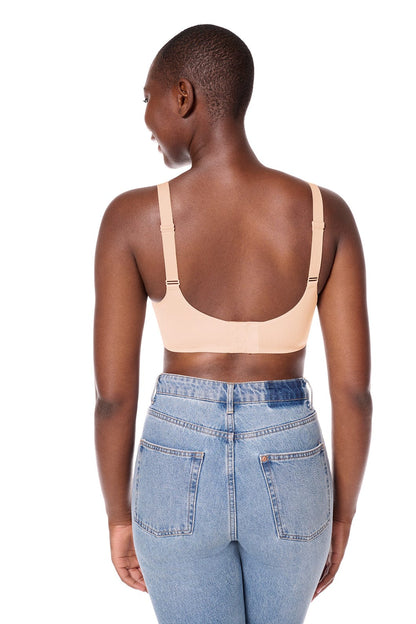 Back view of Aylin seamless bra in blush displaying traditional closure and wide adjustable straps